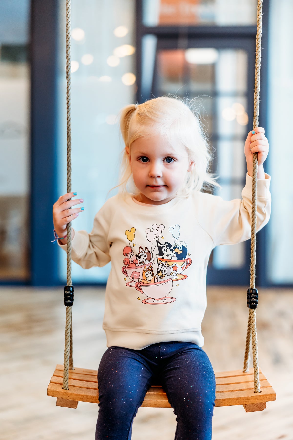 Blue Dogs riding the Teacups Sweatshirt